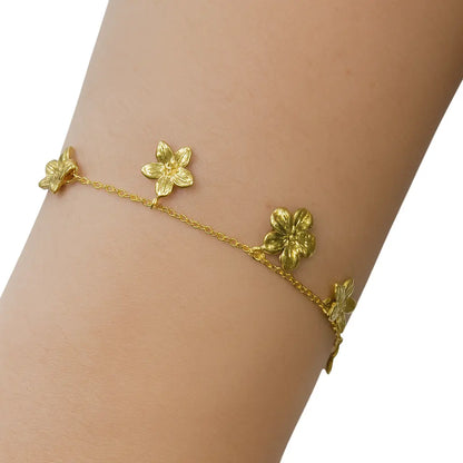 Bracelet Aline –doré à fleurs pendantes - Harmony & Senteur