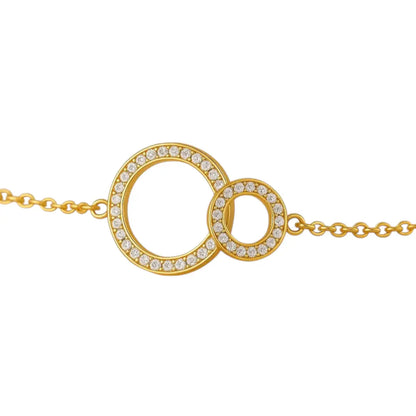 Bracelet doré Étreinte Eternelle– Duo d’anneaux & cristaux blancs Harmony & Senteur